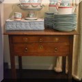 F20. Two-drawer table. 